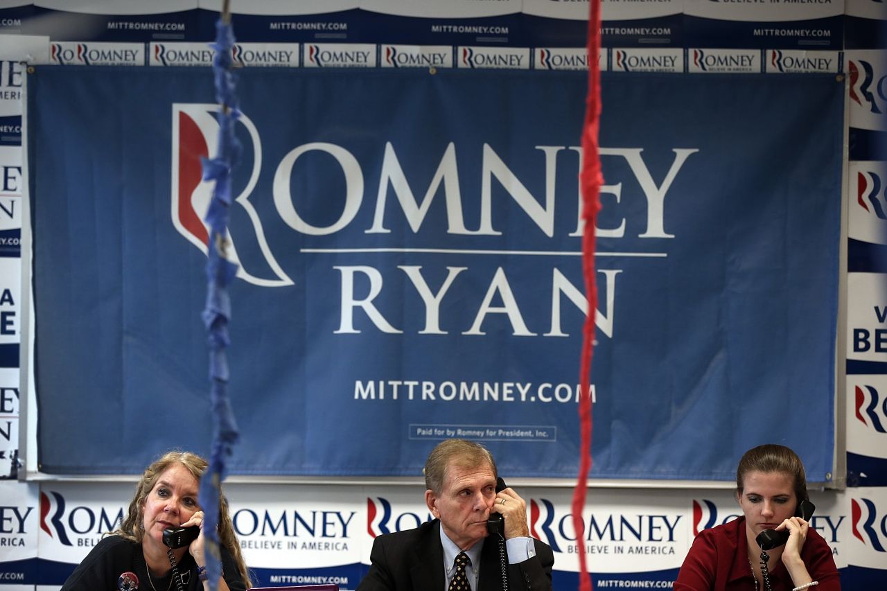 Volunteers make phone calls seeking support for Romney at his Arlington Victory Center in Virginia. 