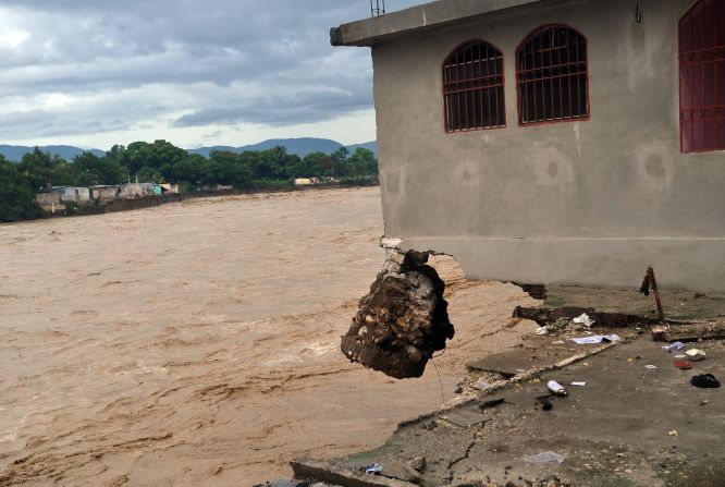 A house ruined by heavy flooding from Hurricane Sandy sits abandoned in Port-au-Prince, Haiti, on Thursday.