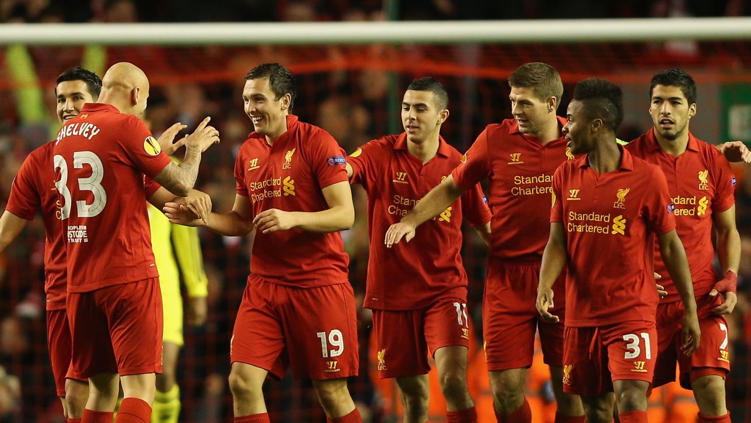 Stewart Downing (19) is congratulated by his teammates after scoring the winner for Liverpool against Anzhi