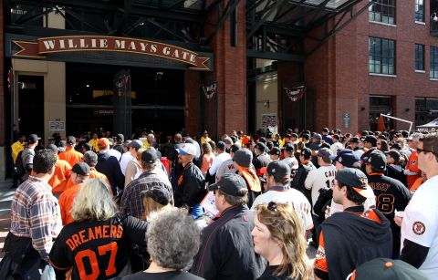 Fans gather outside the stadium before the start of Game 1.