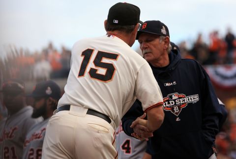 Giants manager Bruce Bochy, left, shakes hands with Tigers manager Jim Leyland in the dugout prior to Game 1.