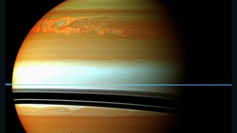 These red, orange and green clouds on Saturn represent the tail end of a 2010/11 massive storm. 