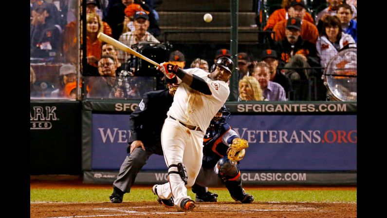 Pablo Sandoval of the San Francisco Giants hits a single in the sixth inning against the Detroit Tigers. 