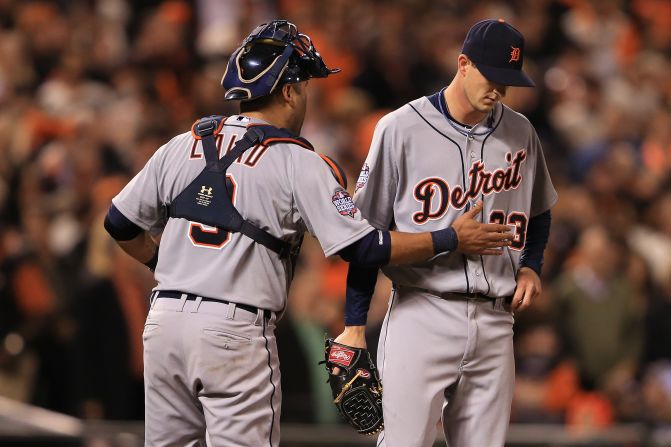 Catcher Gerald Laird of the Detroit Tigers talks with pitcher Drew Smyly on the mound.