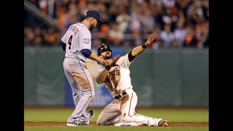 Angel Pagan of the San Francisco Giants calls for time out after stealing second base in the eighth inning.