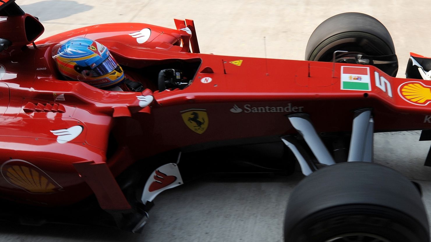 The Italian navy's flag is featured on Ferrari's cars for the Indian Grand Prix in New Delhi 