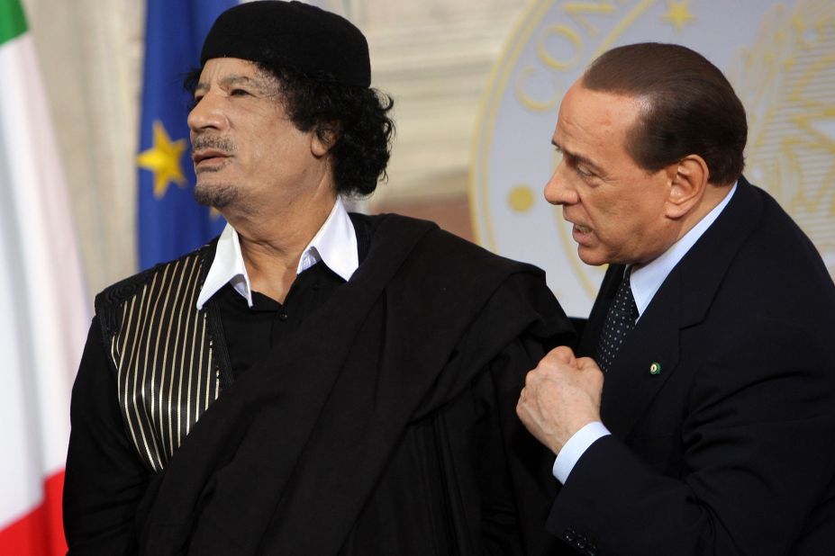 <a href="https://www.cnn.com/2013/09/26/world/africa/moammar-gadhafi-fast-facts/index.html">Libya's Moammar Gadhafi </a>attends a meeting with Berlusconi in Rome in June 2009. The Libyan leader was killed in 2011 after being captured by rebel forces in his hometown.