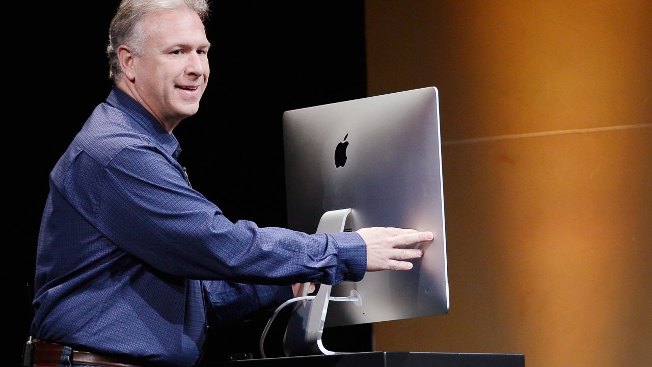 Apple marketing chief Phil Schiller shows off an ultra-thin new iMac at Apple's launch event in October.