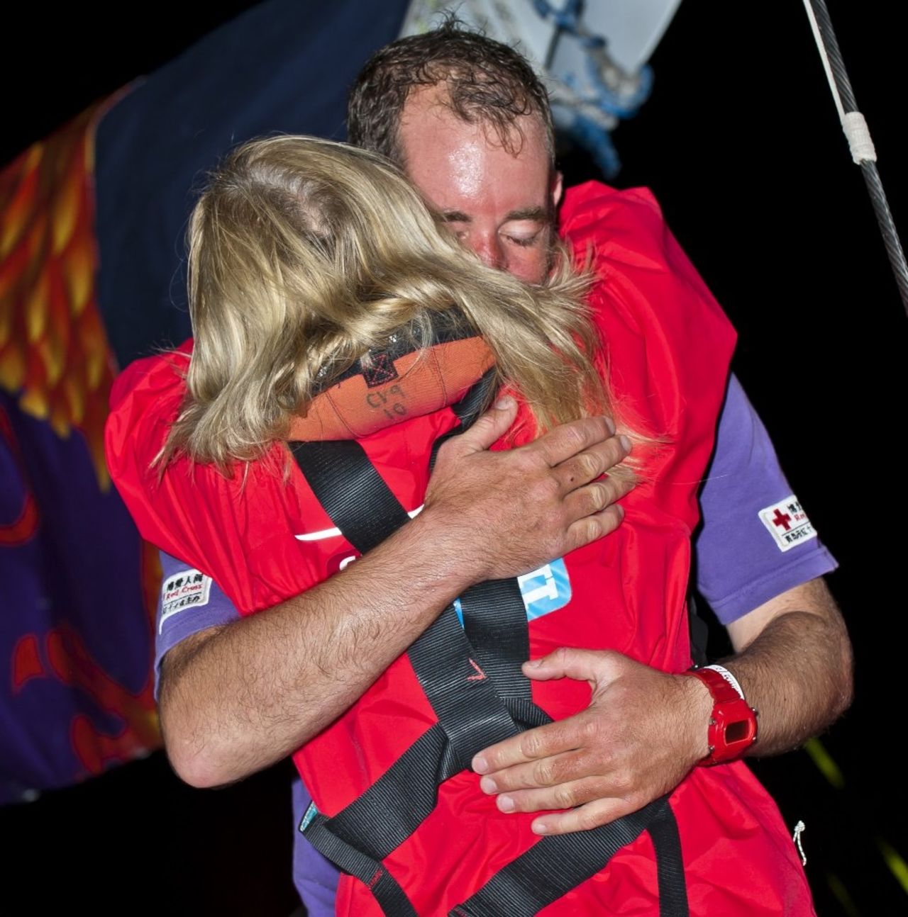 Qingdao crew members, David Hall and Joanna Sandford, embrace after arriving in Western Australia. "You learn a lot about the people on board -- it's human interaction on a really deep level," said sailor Lisa Blair.