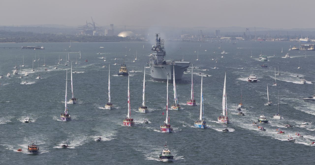 HMS Illustrious accompanies the fleet of 10 boats out of Southampton at the start of their year-long Clipper Round the World Yacht Race. The 70 foot yachts traveled 64,500km across the globe, visiting 15 ports on six continents.