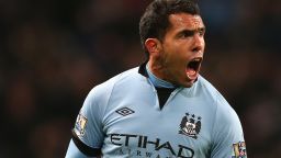 Carlos Tevez celebrates after scoring the only goal in Manchester City's 1-0 win at home to Swansea.
