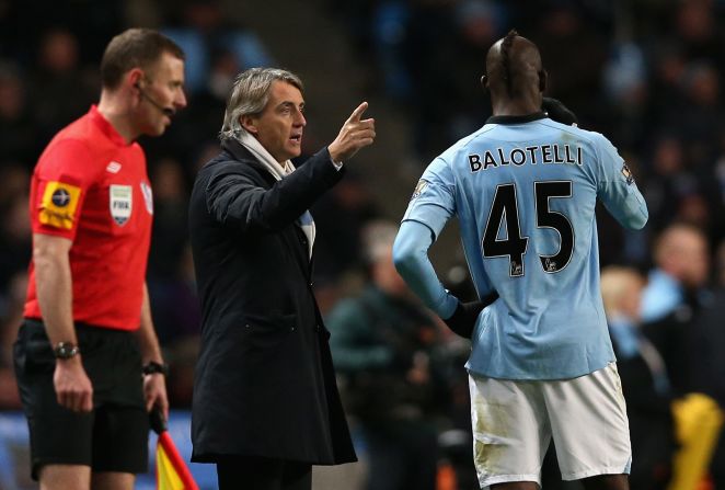 Manchester City manager Roberto Mancini, criticized for his tactics during the midweek Champions League defeat at Ajax, was forced to make a halftime substitution due to an injury to Aleksandar Kolarov. He brought on striker Mario Balotelli.