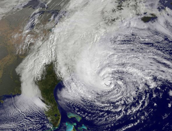 A satellite image from 10:10 a.m. ET on Sunday shows Hurricane Sandy in the Atlantic Ocean grazing the East Coast.