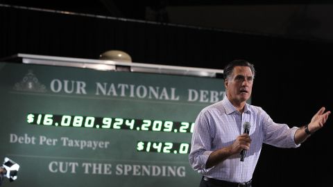 John Avlon says Mitt Romney, pictured at a September rally,  talks about cutting the U.S. debt, but President Obama's plan is closer to what needs to be done.