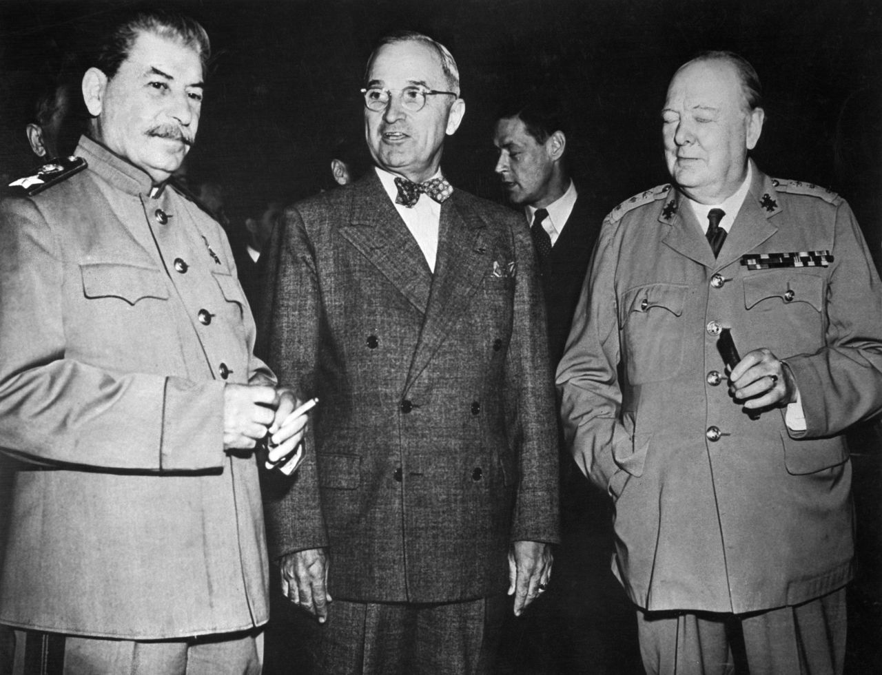 Harry S. Truman stands between Sir Winston Churchill, right, and Soviet leader Joseph Stalin at a meeting in Potsdam, Germany, in 1946 after World War II ended.