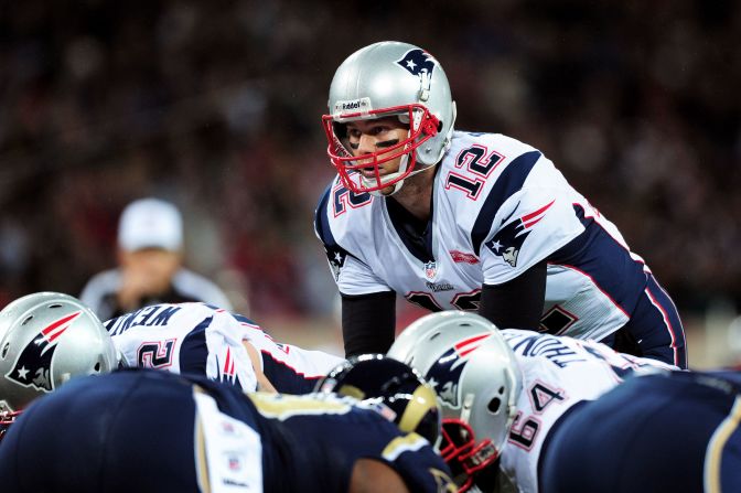 New England's Tom Brady prepares to take a snap during Sunday's game.