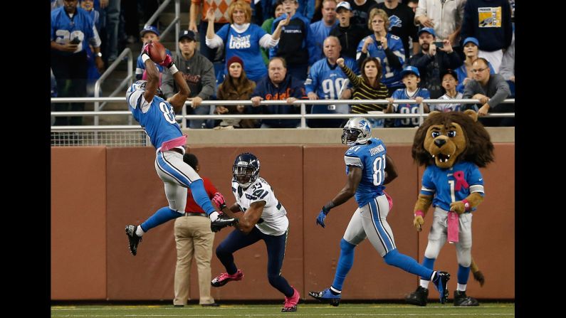 No. 84 Ryan Broyles of the Detroit Lions scores on a 6-yard pass from Matthew Stafford during the first quarter of the Lions' game against the Seattle Seahawks in Detroit on Sunday.