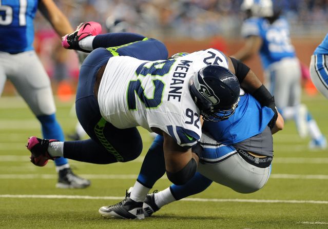 Defensive tackle Brandon Mebane of the Seattle Seahawks sacks quarterback Matthew Stafford of the Detroit Lions on Sunday at Ford Field in Detroit.