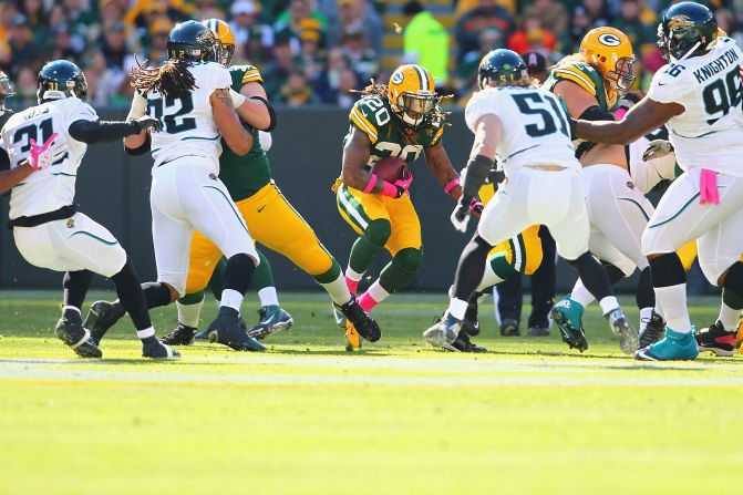 No. 20 Alex Green of the Green Bay Packers rushes against the Jacksonville Jaguars at Lambeau Field on Sunday in Green Bay, Wisconsin.