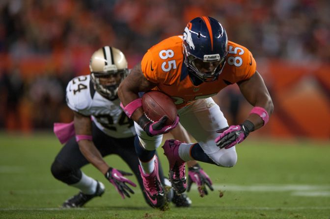 Tight end Virgil Green of the Denver Broncos dives for yards after the catch during a game against the Saints.