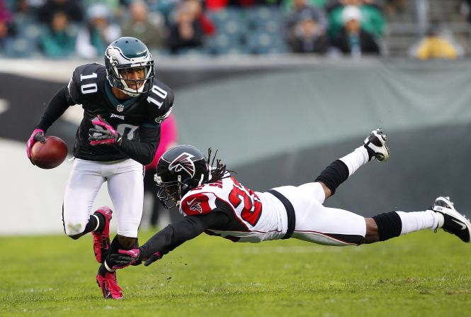 Wide receiver DeSean Jackson of the Philadelphia Eagles runs past a diving Asante Samuel of the Atlanta Falcons during the first half at Lincoln Financial Field on Sunday in Philadelphia.