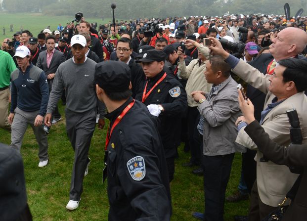 "The scene was barely-controlled chaos," <a target="_blank" target="_blank">wrote Sports Illustrated's Alan Shipnuck</a>. "Some 3,000 fans streamed across the fairways, with soldiers locking arms in a human fence to keep the throngs off the greens."