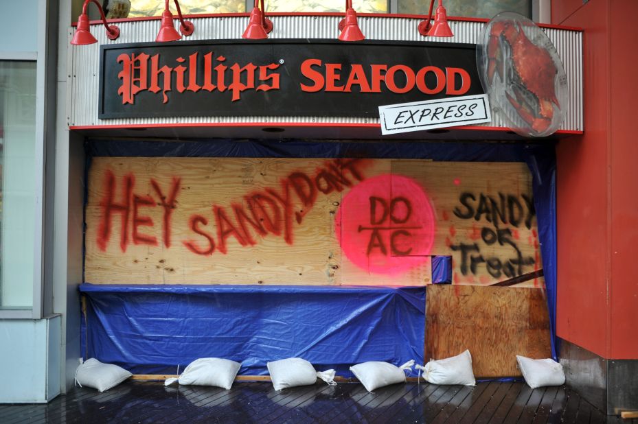 A restaurant on the boardwalk in Atlantic City, New Jersey, is boarded up in preparation for the bad weather on Monday. 
