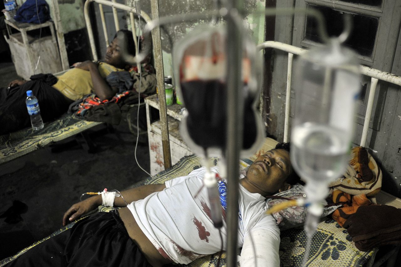 A victim of the violence receives hospital treatment. The U.N. said the violence, fear and mistruct were contrary to the country's fledgling democratic transition.