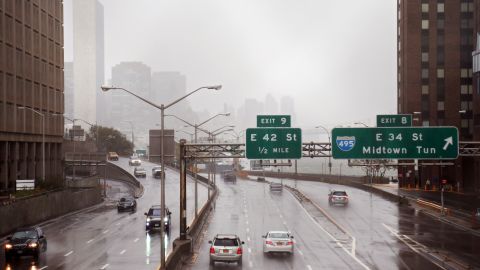 Motorists drive on FDR Drive along the banks of the East River in Manhattan on Monday before Hurricane Sandy makes landfall.