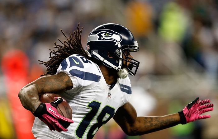 Sidney Rice of the Seattle Seahwaks runs for a first down against the Detroit Lions on Sunday in Detroit. The Lions defeated the Seahawks 28-24.