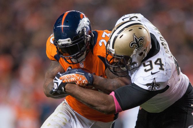 Defensive end Cameron Jordan of the New Orleans Saints tackles running back Willis McGahee of the Denver Broncos in Denver on Sunday. The Broncos beat the Saints 34-14.