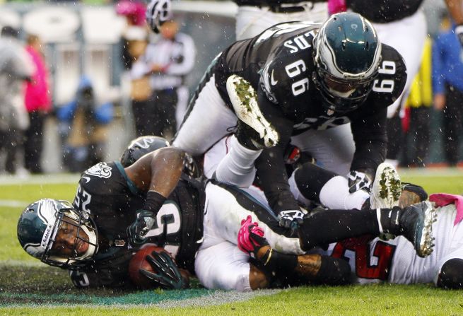 Eagles running back LeSean McCoy, No. 25, is tackled in the end zone for a touchdown against the Atlanta Falcons during the second half on Sunday.