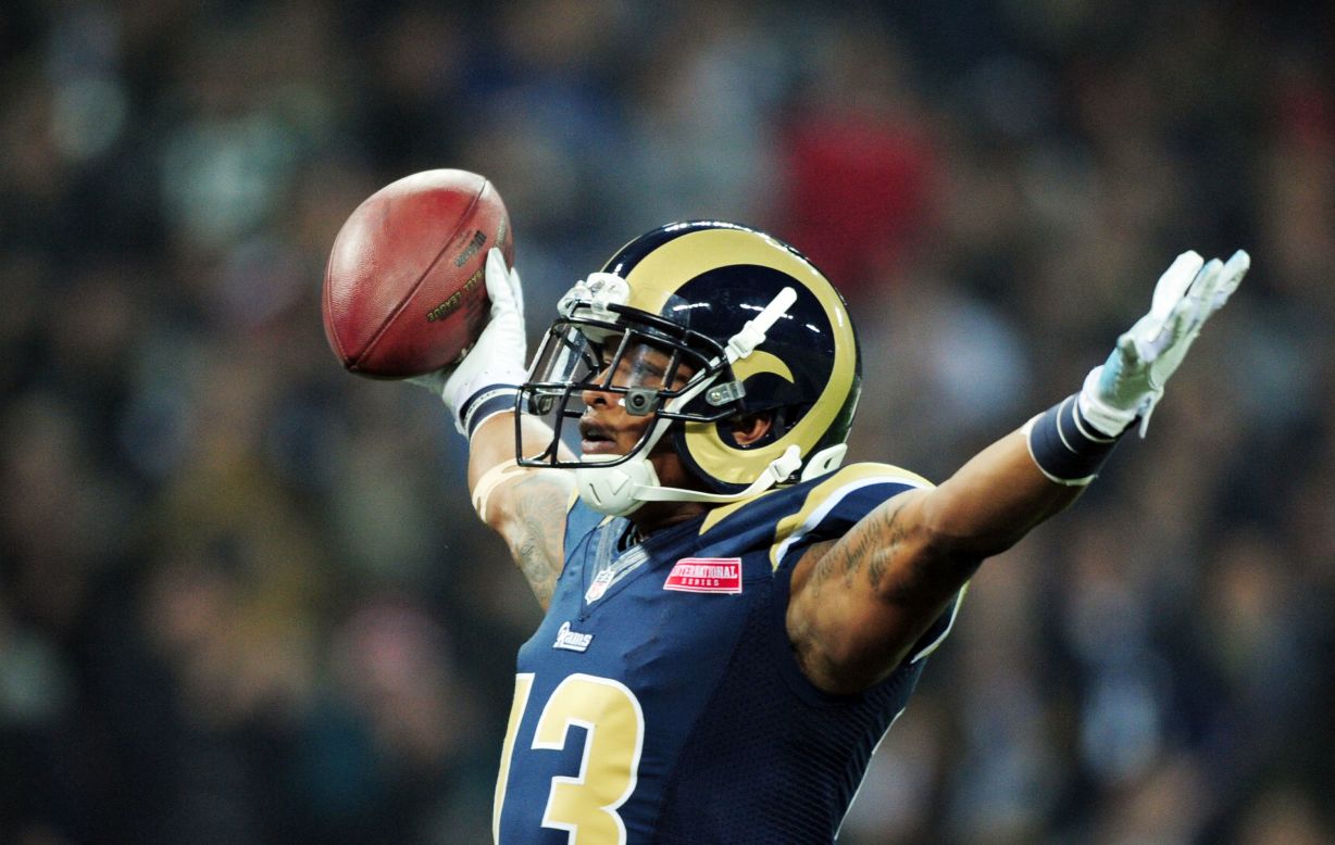 St. Louis' Chris Givens celebrates scoring the match's opening touchdown from Sam Bradford's 50-yard pass, but Rams fans had little to cheer about after that. 