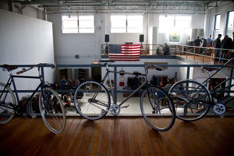 Handcrafted bicyles from Chicago's <a href="http://www.heritagebicycles.com/" target="_blank" target="_blank">Heritage General Store</a>, a hybrid coffee shop and full-service bike shop, adorn the showroom.