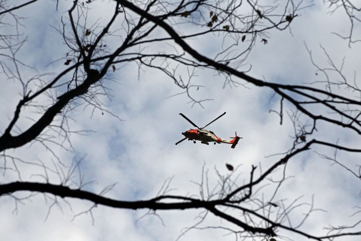 A U.S. Coast Guard helicopter flies over Central Park in New York City.