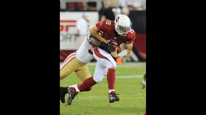 John Skelton of the Arizona Cardinals attempts to break a tackle during Monday night's game against the San Francisco 49ers.