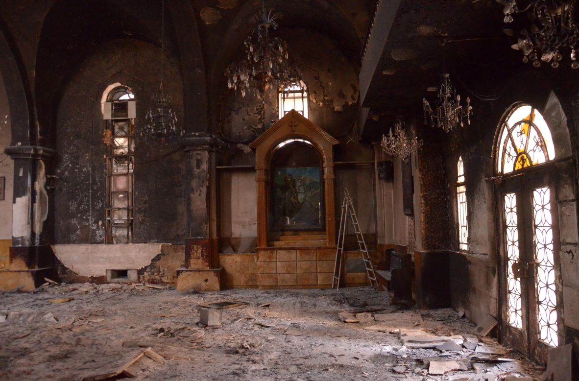 The Armenian Surp Kevork Church (Saint George Church) in Aleppo shows damage on Tuesday from a fire that broke out during fighting between rebel fighters and Syrian government forces.