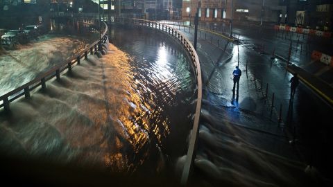 Water from Hurricane Sandy rushes into the Carey Tunnel in the Financial District of New York on October 29, 2012.