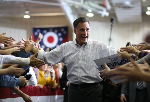 Romney greets supporters during a campaign rally at Avon Lake High School on Monday in Avon Lake, Ohio. Romney canceled other campaign events planned for Monday and Tuesday due to Hurricane Sandy.