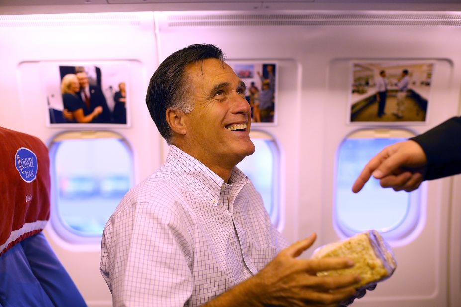 Romney holds a giant cinnamon roll on Monday en route to Dayton, Ohio. 