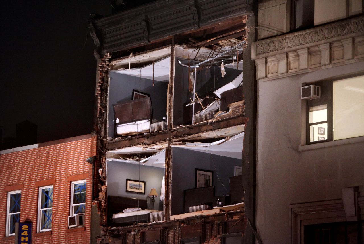 The facade of an apartment building collapsed on Monday, October 29, in the Chelsea neighborhood of Manhattan. Superstorm Sandy smashed ashore in the northeastern United States Monday night, triggering floods, fires and devastation. <a href="http://www.cnn.com/2012/10/25/americas/gallery/weather-sandy/index.html">See more photos of Sandy's destructive path.</a>