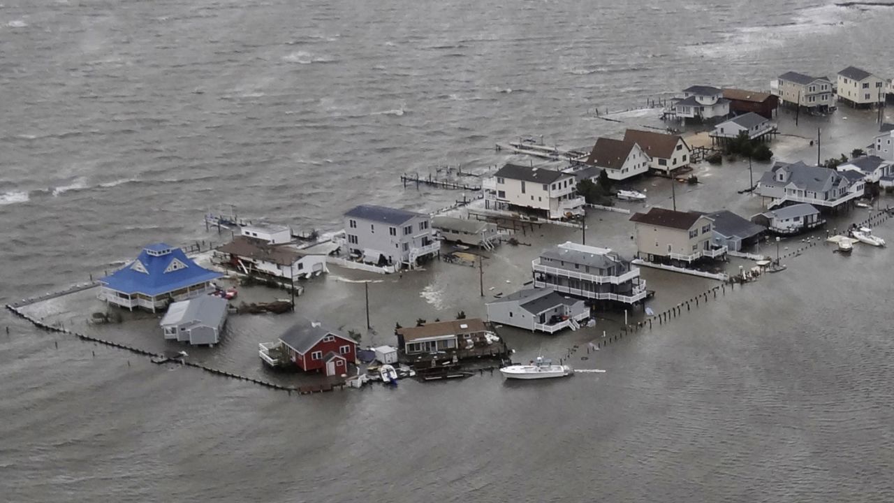 Homes are flooded Tuesday in Tuckerton, New Jersey. President Barack Obama signed major disaster declarations for New Jersey and New York, clearing the way for federal aid.