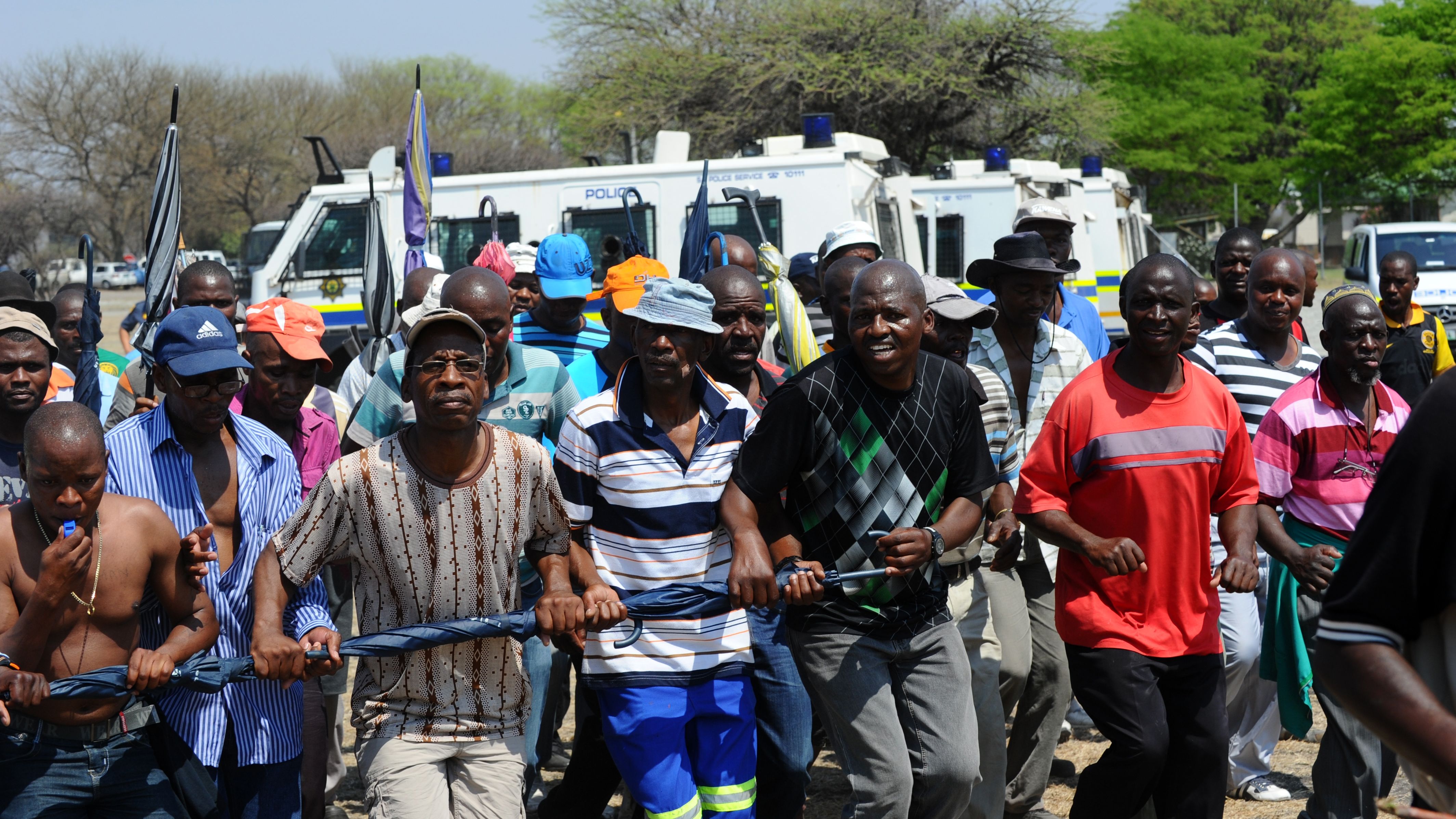 Some of the 12,000 miners sacked by Anglo American Platinum protest their dismissal in Rustenberg on October 6, 2012.