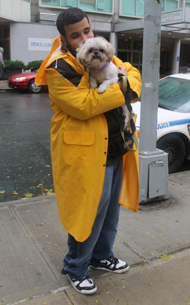 One of the adoptable dogs at the ASPCA Adoption Center in New York gets one last walk before Hurricane Sandy strikes.