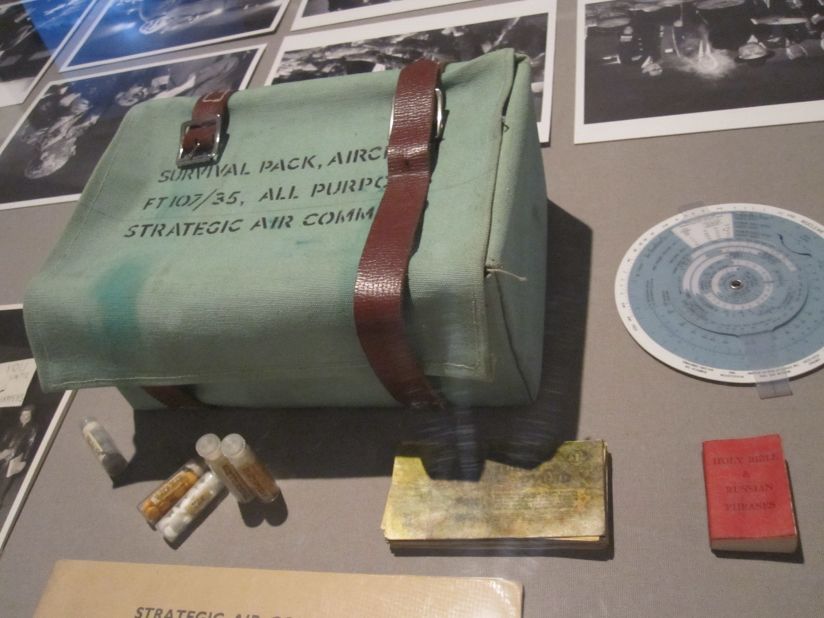 The survival kit issued to the bomber crew in "Dr. Strangelove." Note the teeny tiny red book containing not just the Holy Bible, but a useful list of Russian phrases as well.