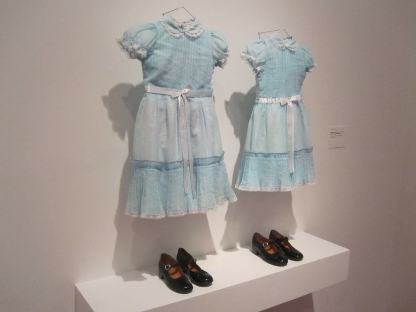 The blue dresses worn by the ghostly twins of "The Shining" are just as chilling off the movie set. 