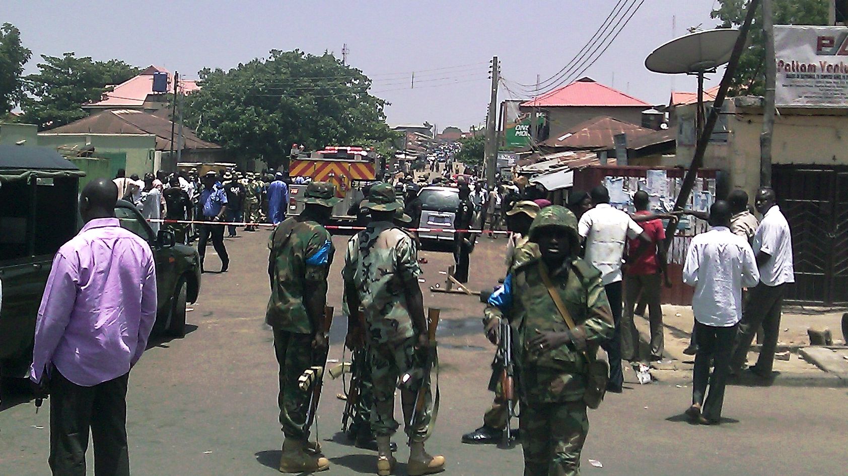 Security forces personnel pictured at the site of a blast in Kaduna on April 26, 2012.