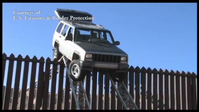 smugglers jeep stuck on border fence_00004511