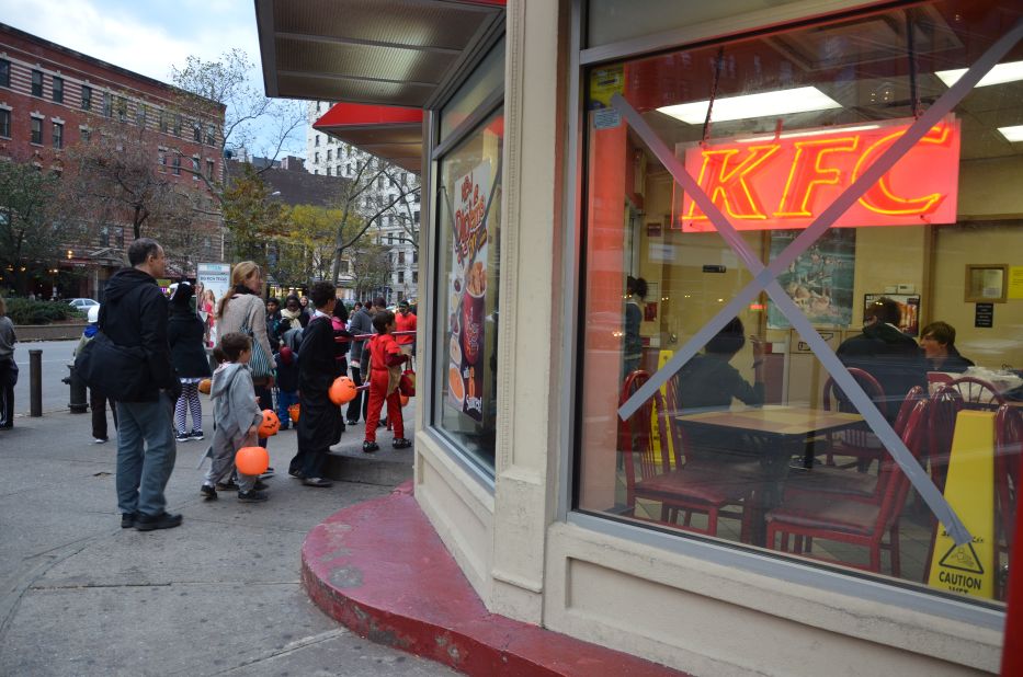 Kaplan said there was an unusual atmosphere in the streets. "Stores did not have any decorations, or had tape and boards over the front windows. Half of them are still closed down. And the half that were open were almost all out of candy," she said.
