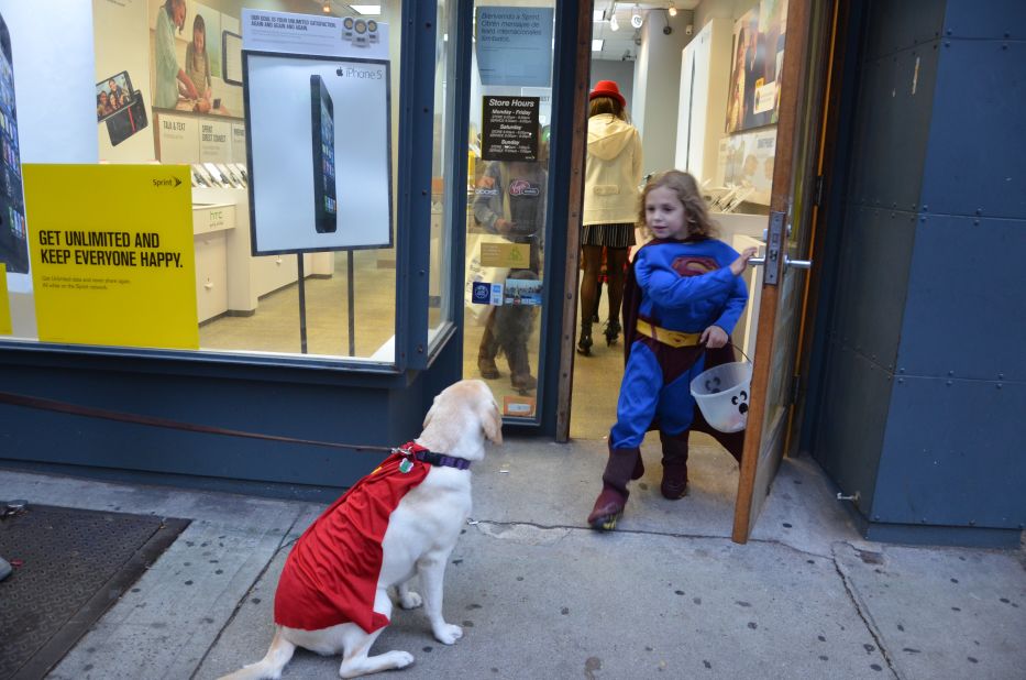 Simply attach shiny fabric to your dog's collar and voila: instant canine sidekick. iReporter Jodi Kaplan snapped this superdog while trick-or-treating in New York.